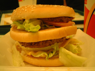 is Big Mc Burger + Sliced Tomato + Fried Egg.